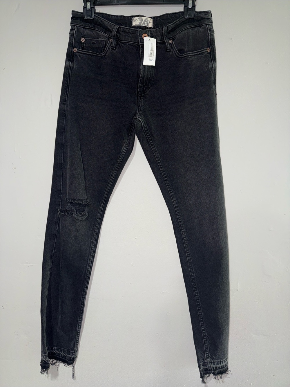 We The Free Black Distressed Skinny Jeans